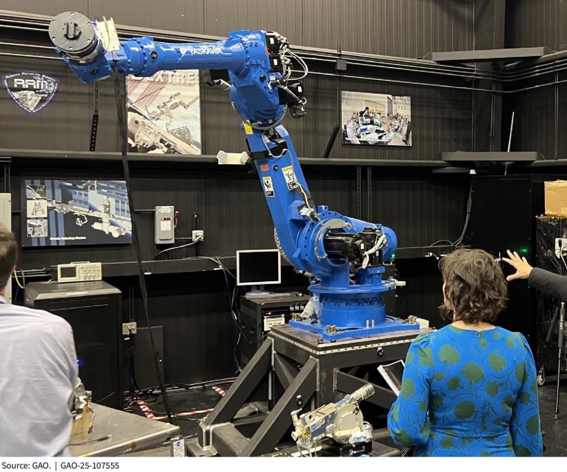 A robotic arm rehearses an autonomous satellite-servicing approach in a government test rig